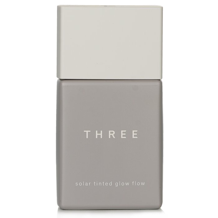 THREE Solar Tinted Glow Flow Liquid Foundation SPF50 04 for glowing skin